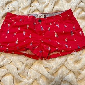 Red shorts with sailboats